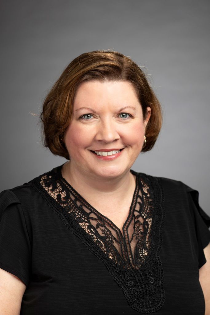 woman with red bob haircut
